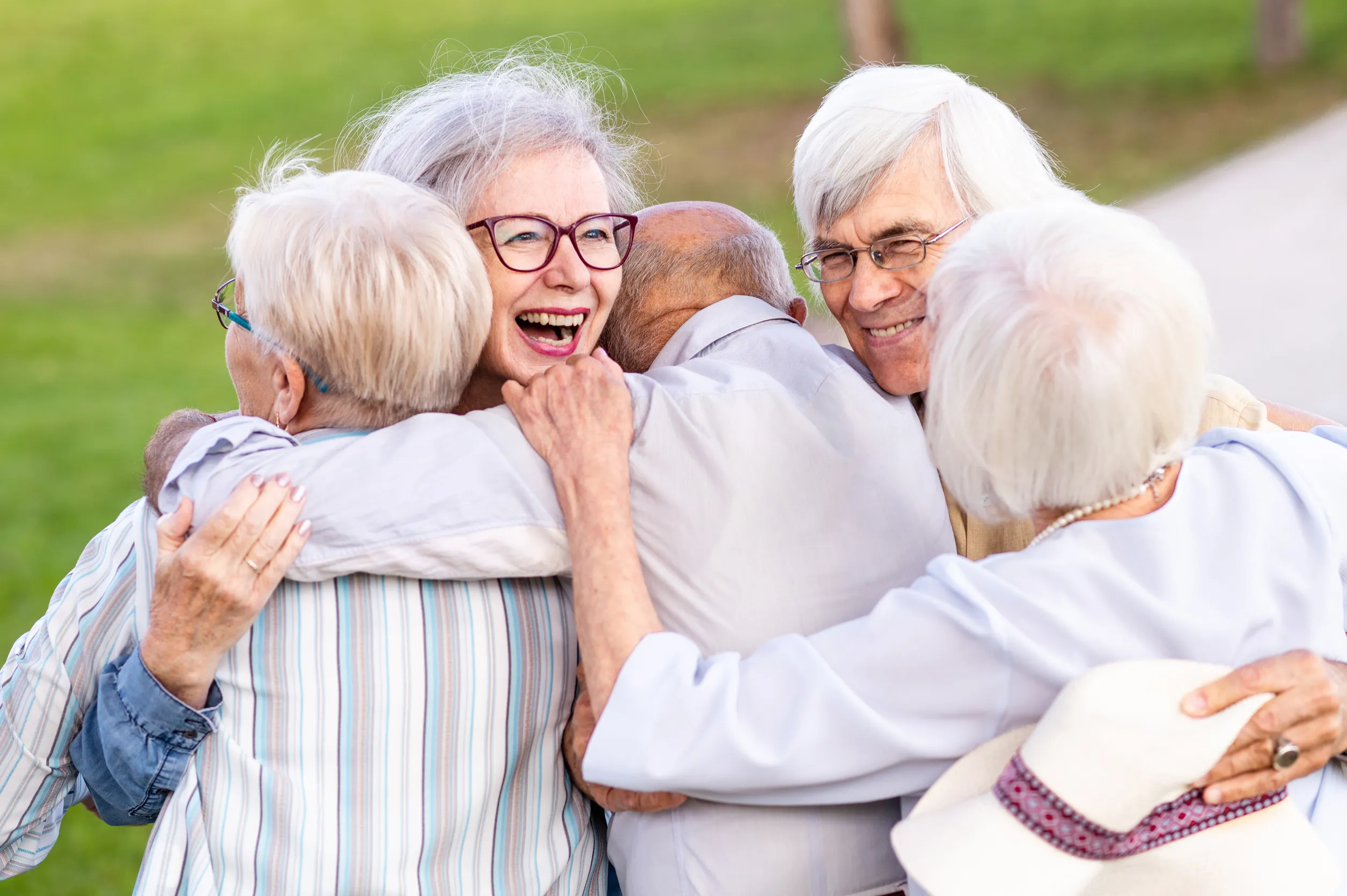 Group of happy elderly people spending time together at outdoors at the park Group of happy elderly people spending time together at outdoors at the park